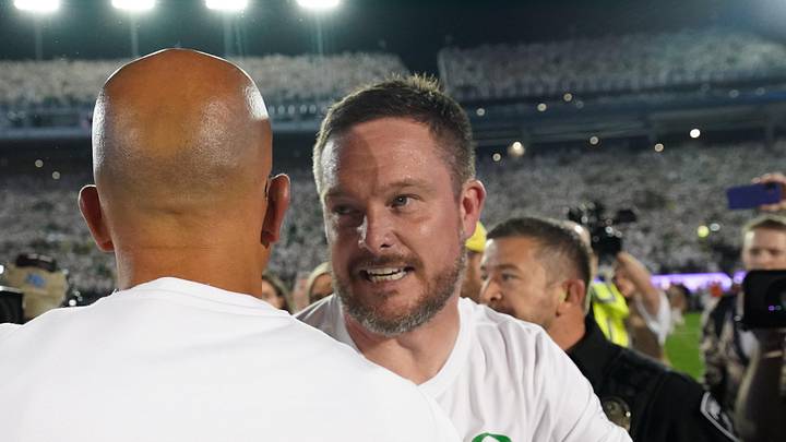 Sep 27, 2025; University Park, Pennsylvania, USA; Oregon Ducks head coach Dan Lanning greets Penn State Nittany Lions head coach James Franklin following a win over the Penn State Nittany Lions at Beaver Stadium. Mandatory Credit: James Lang-Imagn Images Sep 27, 2025; University Park, Pennsylvania, USA; Oregon Ducks head coach Dan Lanning greets Penn State Nittany Lions head coach James Franklin following a win over the Penn State Nittany Lions at Beaver Stadium. Mandatory Credit: James Lang-Imagn Images