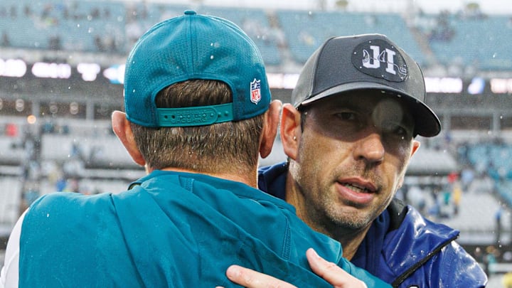 Dec 7, 2025; Jacksonville, Florida, USA; Jacksonville Jaguars head coach Liam Coen and Indianapolis Colts head coach Shane Steichen embrace after a game at EverBank Stadium. Mandatory Credit: Matt Pendleton-Imagn Images