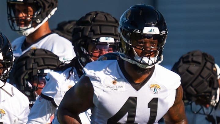 Jacksonville Jaguars linebacker Foyesade Oluokun (23) and Jacksonville Jaguars defensive end Josh Hines-Allen (41) warm up during an NFL training camp second session at the Miller Electric Center, Thursday, July 24, 2025, in Jacksonville, Fla. [Doug Engle/Florida Times-Union]