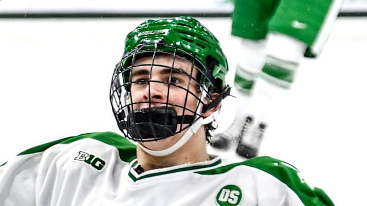 Michigan State's Porter Martone celebrates his empty net goal against Notre Dame during the third period on Thursday, Feb. 19, 2026, at the Munn Ice Arena in East Lansing.
