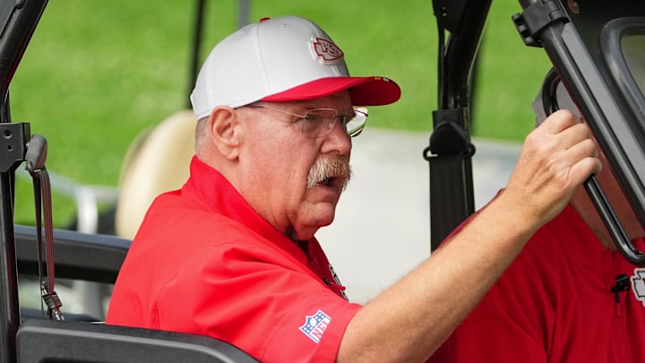 Jul 22, 2025; St. Joseph, MO, USA; Kansas City Chiefs head coach Andy Reid rides a cart down the hill to the fields prior to training camp at Missouri Western State University. Mandatory Credit: Denny Medley-Imagn Images