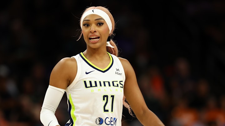 Jun 11, 2025; Phoenix, Arizona, USA; Dallas Wings guard DiJonai Carrington (21) against the Phoenix Mercury at PHX Arena. Mandatory Credit: Mark J. Rebilas-Imagn Images