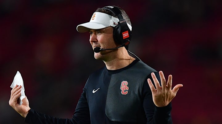 Sep 20, 2025; Los Angeles, California, USA; Southern California Trojans head coach Lincoln Riley watches game action against the Michigan State Spartans during the second half at the Los Angeles Memorial Coliseum. Mandatory Credit: Gary A. Vasquez-Imagn Images Sep 20, 2025; Los Angeles, California, USA; Southern California Trojans head coach Lincoln Riley watches game action against the Michigan State Spartans during the second half at the Los Angeles Memorial Coliseum. Mandatory Credit: Gary A. Vasquez-Imagn Images