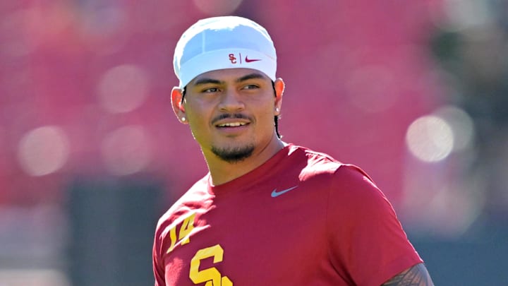 Oct 11, 2025; Los Angeles, California, USA;  USC Trojans quarterback Jayden Maiava (14) warms up prior to the game against the Michigan Wolverines at United Airlines Field at the Los Angeles Memorial Coliseum. Mandatory Credit: Jayne Kamin-Oncea-Imagn Images