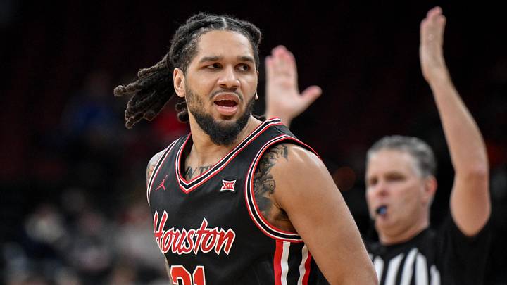 Dec 20, 2025; Newark, New Jersey, USA; Houston Cougars guard Emanuel Sharp (21) reacts after making a three point basket against the Arkansas Razorbacks during the second half at Prudential Center. Mandatory Credit: John Jones-Imagn Images Dec 20, 2025; Newark, New Jersey, USA; Houston Cougars guard Emanuel Sharp (21) reacts after making a three point basket against the Arkansas Razorbacks during the second half at Prudential Center. Mandatory Credit: John Jones-Imagn Images
