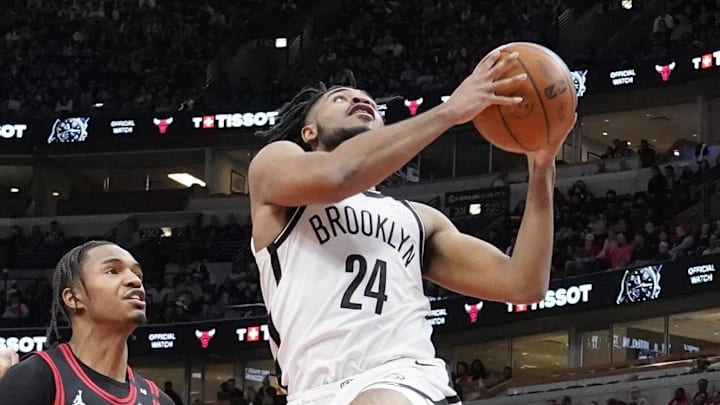Mar 13, 2025; Chicago, Illinois, USA; Chicago Bulls forward Julian Phillips (15) defends Brooklyn Nets guard Cam Thomas (24) during the second half at United Center. Mandatory Credit: David Banks-Imagn Images Mar 13, 2025; Chicago, Illinois, USA; Chicago Bulls forward Julian Phillips (15) defends Brooklyn Nets guard Cam Thomas (24) during the second half at United Center. Mandatory Credit: David Banks-Imagn Images