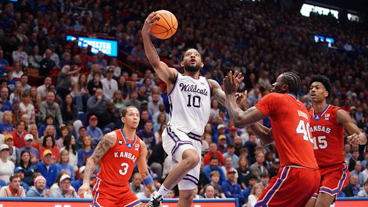 Kansas State Wildcats guard David Castillo (10) jumps for a layup against Kansas Jayhawks during the Sunflower Showdown game inside Allen Fieldhouse in Lawrence, Kansas, on Saturday, March 7, 2026.