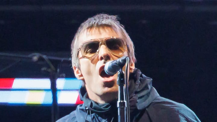 Oasis performs during 2025 tour