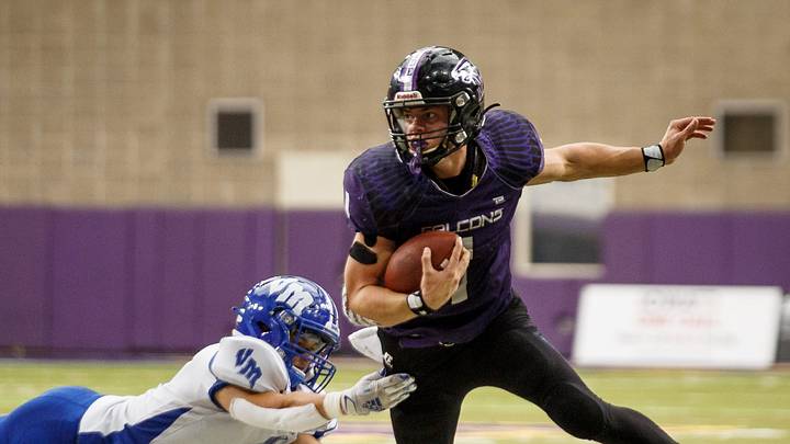 OABCIG's Cooper Dejean (1) escapes a tackle on his way to the go-ahead touchdown during their Class 1A state football championship game on Friday, Nov. 20, 2020, in Cedar Falls. OABCIG's Cooper Dejean (1) escapes a tackle on his way to the go-ahead touchdown during their Class 1A state football championship game on Friday, Nov. 20, 2020, in Cedar Falls.