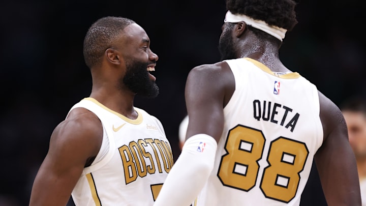 Mar 1, 2026; Boston, Massachusetts, USA; Boston Celtics forward Jaylen Brown (7) and Boston Celtics center Neemias Queta (88) celebrate during the first half against the Philadelphia 76ers at TD Garden. Mandatory Credit: Paul Rutherford-Imagn Images