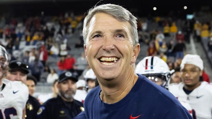 Nov 28, 2025; Tempe, Arizona, USA; Arizona Wildcats head coach Brent Brennan celebrates against the Arizona State Sun Devils during the 99th Territorial Cup at Mountain America Stadium. Mandatory Credit: Mark J. Rebilas-Imagn Images Nov 28, 2025; Tempe, Arizona, USA; Arizona Wildcats head coach Brent Brennan celebrates against the Arizona State Sun Devils during the 99th Territorial Cup at Mountain America Stadium. Mandatory Credit: Mark J. Rebilas-Imagn Images
