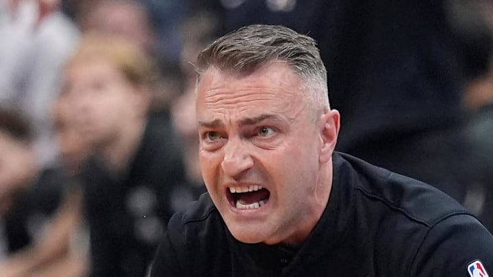 Toronto Raptors head coach Darko Rajakovic reacts to game play against the Miami Heat.