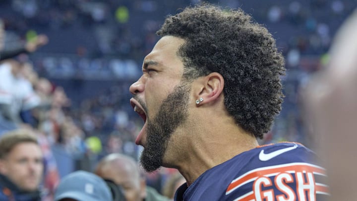 Chicago Bears quarterback Caleb Williams reacts with fans after the second half of an NFL International Series game. Chicago Bears quarterback Caleb Williams reacts with fans after the second half of an NFL International Series game.