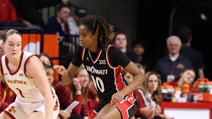Jan 21, 2026; Ames, Iowa, USA; Iowa State Cyclones guard Reese Beaty (1) is defended by Cincinnati Bearcats forward Kylie Torrence (10) during the second half at James H. Hilton Coliseum. Mandatory Credit: Reese Strickland-Imagn Images