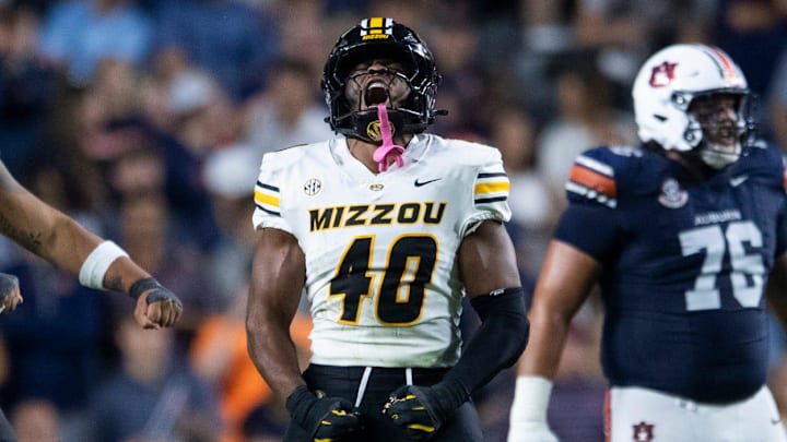 Missouri Tigers linebacker Josiah Trotter (40) celebrates a defensive stop as Auburn Tigers take on Missouri Tigers at Jordan-Hare Stadium in Auburn, Ala. on Saturday, Oct. 18, 2025. Missouri Tigers defeated the Auburn Tigers 23-17 in 2OT.