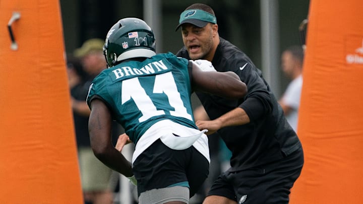 Jul 29, 2022; Philadelphia, PA, USA; Philadelphia Eagles wide receiver A.J. Brown (11) runs a drill with receivers coach Aaron Moorehead during training camp at NovaCare Complex.