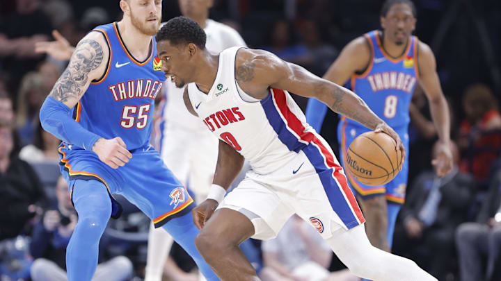 Apr 2, 2025; Oklahoma City, Oklahoma, USA; Detroit Pistons center Jalen Duren (0) drives to the basket beside Oklahoma City Thunder center Isaiah Hartenstein (55) during the second half at Paycom Center. Mandatory Credit: Alonzo Adams-Imagn Images