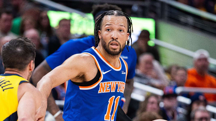 Mar 13, 2026; Indianapolis, Indiana, USA;  New York Knicks guard Jalen Brunson (11) dribbles the ball while Indiana Pacers guard T.J. McConnell (9) defends in the second half at Gainbridge Fieldhouse. Mandatory Credit: Trevor Ruszkowski-Imagn Images