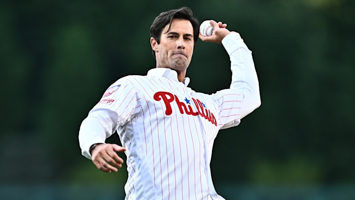 Jun 21, 2024; Philadelphia, Pennsylvania, USA; Former Philadelphia Phillies pitcher Cole Hamels throws a ceremonial first pitch before the game against the Arizona Diamondbacks at Citizens Bank Park.