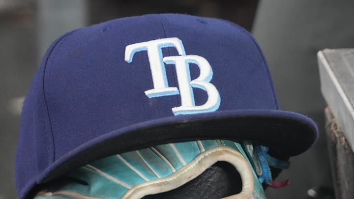 Sep 26, 2025; Toronto, Ontario, CAN; The hat and glove of Tampa Bay Rays third baseman Junior Caminero (13) in the dugout during the game against the Toronto Blue Jays at Rogers Centre. Sep 26, 2025; Toronto, Ontario, CAN; The hat and glove of Tampa Bay Rays third baseman Junior Caminero (13) in the dugout during the game against the Toronto Blue Jays at Rogers Centre.
