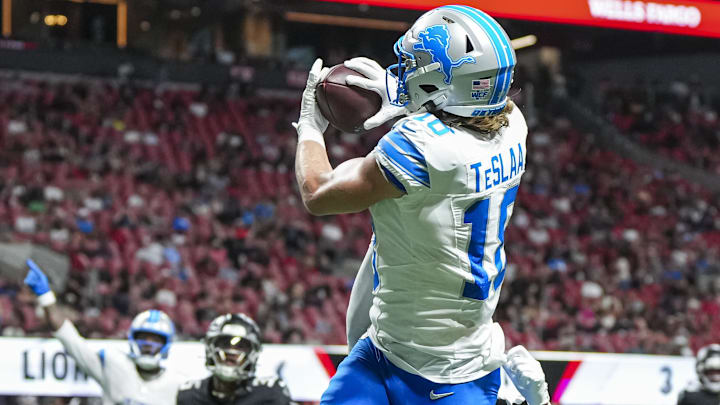 Detroit Lions wide receiver Isaac TeSlaa (18) catches a touchdown pass behind Atlanta Falcons cornerback Dee Alford (20) during the second quarter at Mercedes-Benz Stadium. Detroit Lions wide receiver Isaac TeSlaa (18) catches a touchdown pass behind Atlanta Falcons cornerback Dee Alford (20) during the second quarter at Mercedes-Benz Stadium.
