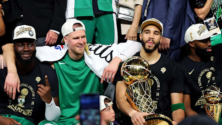 Jun 17, 2024; Boston, Massachusetts, USA; The Boston Celtics celebrates after beating the Dallas Mavericks in game five of the 2024 NBA Finals to the NBA Championship at TD Garden. Mandatory Credit: Peter Casey-Imagn Images