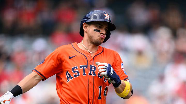 Sep 28, 2025; Anaheim, California, USA; Houston Astros shortstop Mauricio Dubon (14) gestures after hitting a single during the first inning against the Los Angeles Angels at Angel Stadium. Mandatory Credit: William Liang-Imagn Images
