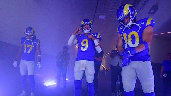Dec 17, 2023; Inglewood, California, USA; Los Angeles Rams quarterback Matthew Stafford (9) wide receiver Puka Nacua (17) and wide receiver Cooper Kupp (10) gather before playing against the Washington Commanders at SoFi Stadium. Mandatory Credit: Gary A. Vasquez-Imagn Images
