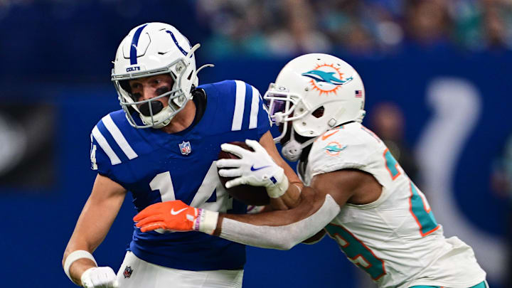 Indianapolis Colts wide receiver Alec Pierce (14) is tackled by former Miami Dolphins cornerback Kendall Fuller (29) 
