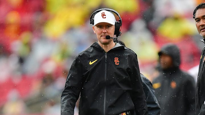 Nov 15, 2025; Los Angeles, California, USA; Southern California Trojans head coach Lincoln Riley watches game action against the Iowa Hawkeyes during the first half at the Los Angeles Memorial Coliseum