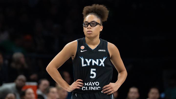 Sep 27, 2026; Minneapolis, Minnesota, USA;  Minnesota Lynx guard Olivia Miles (5) looks on against the New York Liberty in the first half during game one of the first round for the 2026 WNBA Playoffs at Target Center.  Mandatory Credit: Jesse Johnson-Imagn Images