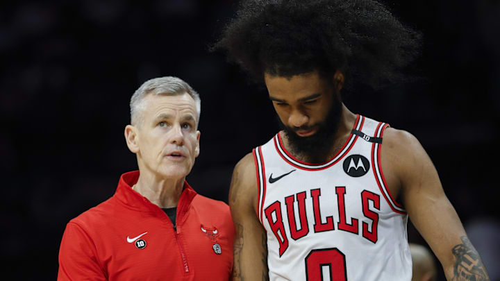 Apr 6, 2025; Charlotte, North Carolina, USA; Chicago Bulls head coach Billy Donovan talks to guard Coby White (0) during the second half against the Charlotte Hornets at Spectrum Center. Mandatory Credit: Nell Redmond-Imagn Images