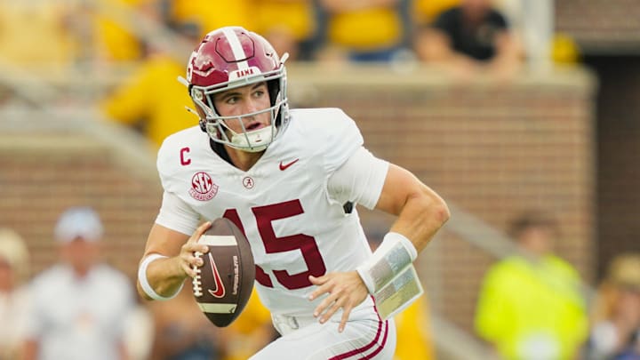 Oct 11, 2025; Columbia, Missouri, USA; Alabama Crimson Tide quarterback Ty Simpson (15) rolls out to pass during the second half against the Missouri Tigers at Faurot Field at Memorial Stadium. Mandatory Credit: Jay Biggerstaff-Imagn Images
