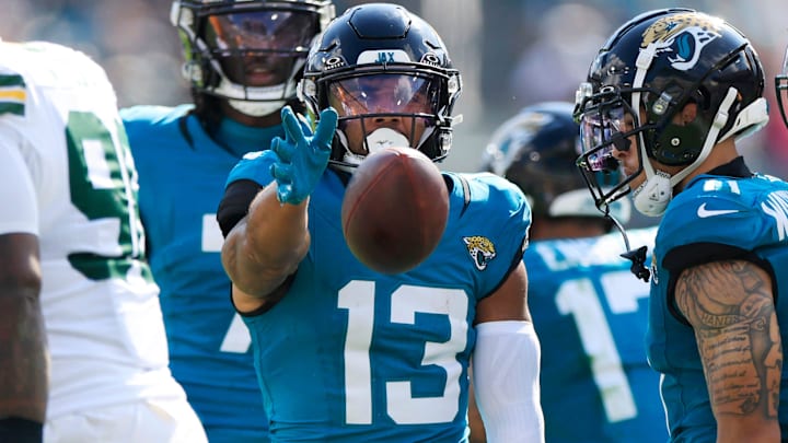 Jacksonville Jaguars wide receiver Christian Kirk (13) signals a first down during the third quarter of an NFL football matchup Sunday, Oct. 27, 2024 at EverBank Stadium in Jacksonville, Fla. The Packers edged the Jaguars 30-27 on a last-second field goal. [Corey Perrine/Florida Times-Union]