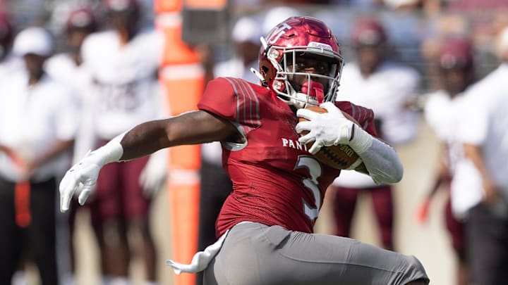 Virginia Union running back Jada Byers breaks the tackle of Morehouse's Cameron Selders as he runs for a first-half touchdown in the Black College Football Hall of Fame Classic, Sunday, Sept. 3, 2023, in Canton.