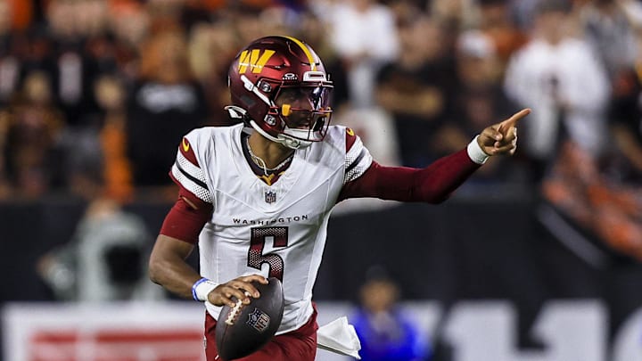 Sep 23, 2024; Cincinnati, Ohio, USA; Washington Commanders quarterback Jayden Daniels (5) runs with the ball against the Cincinnati Bengals in the first half at Paycor Stadium. Mandatory Credit: Katie Stratman-Imagn Images Sep 23, 2024; Cincinnati, Ohio, USA; Washington Commanders quarterback Jayden Daniels (5) runs with the ball against the Cincinnati Bengals in the first half at Paycor Stadium. Mandatory Credit: Katie Stratman-Imagn Images