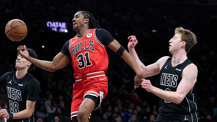 Feb 9, 2026; Brooklyn, New York, USA; Chicago Bulls guard Jaden Ivey (31) is fouled by Brooklyn Nets guard Nolan Traore (88) during the first quarter at Barclays Center. Mandatory Credit: Vincent Carchietta-Imagn Images
