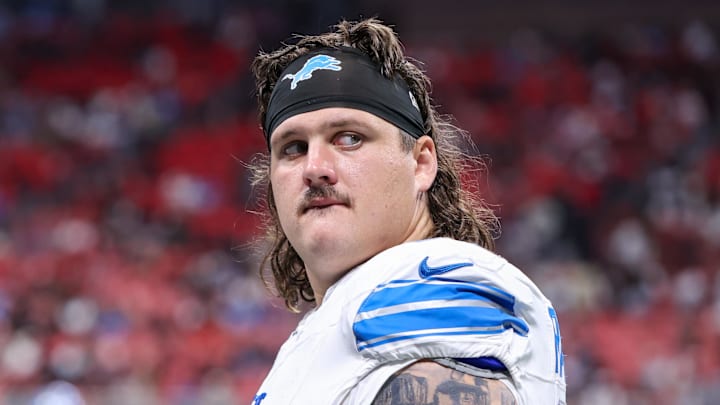 Aug 8, 2025; Atlanta, Georgia, USA; Detroit Lions guard Tate Ratledge (69) after an injury to safety Morice Norris (not pictured) against the Atlanta Falcons in the fourth quarter at Mercedes-Benz Stadium. Mandatory Credit: Brett Davis-Imagn Images