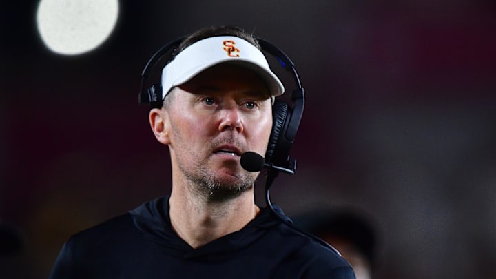 Nov 7, 2025; Los Angeles, California, USA; Southern California Trojans head coach Lincoln Riley watches game action against the Northwestern Wildcats during the second half at the Los Angeles Memorial Coliseum. Mandatory Credit: Gary A. Vasquez-Imagn Images