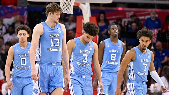 Jan 3, 2026; Dallas, Texas, USA; North Carolina Tar Heels guard Kyan Evans (0) and center Henri Veesaar (13) and guard Derek Dixon (3) and forward Caleb Wilson (8) and guard Seth Trimble (7) come back on the court during the second half against the SMU Mustangs at Moody Coliseum. Mandatory Credit: Jerome Miron-Imagn Images