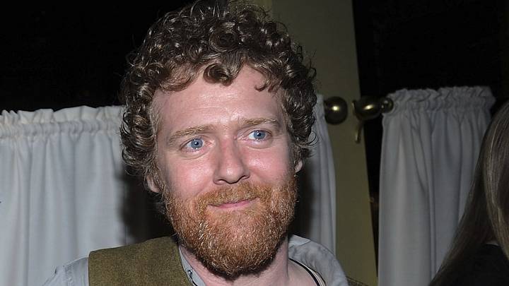 Glen Hansard stands for a photo