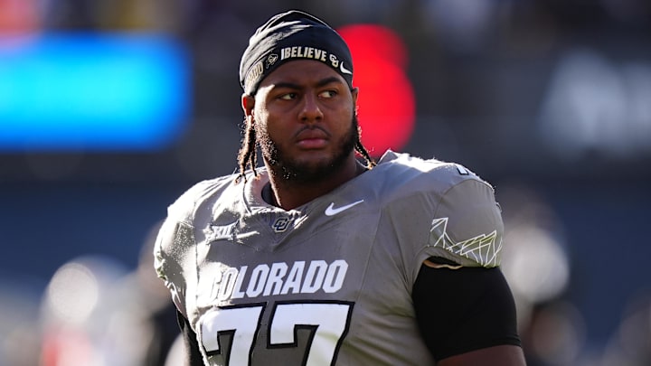 Nov 16, 2024; Boulder, Colorado, USA; Colorado Buffaloes offensive tackle Jordan Seaton (77) looks on before the game against the Utah Utes at Folsom Field. Mandatory Credit: Ron Chenoy-Imagn Images