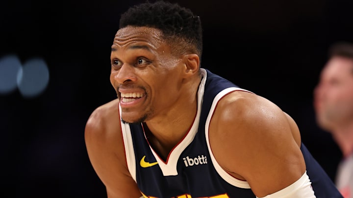 Nov 23, 2024; Los Angeles, California, USA;  Denver Nuggets guard Russell Westbrook (4) reacts to a play during the third quarter against the Los Angeles Lakers at Crypto.com Arena. Mandatory Credit: Kiyoshi Mio-Imagn Images