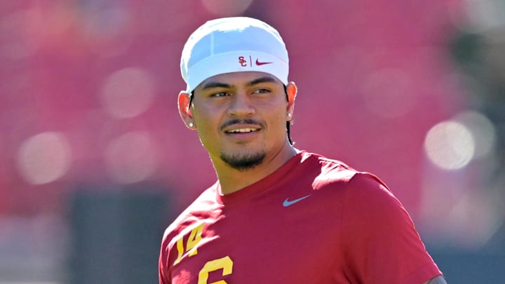Oct 11, 2025; Los Angeles, California, USA;  USC Trojans quarterback Jayden Maiava (14) warms up prior to the game against the Michigan Wolverines at United Airlines Field at the Los Angeles Memorial Coliseum. Mandatory Credit: Jayne Kamin-Oncea-Imagn Images