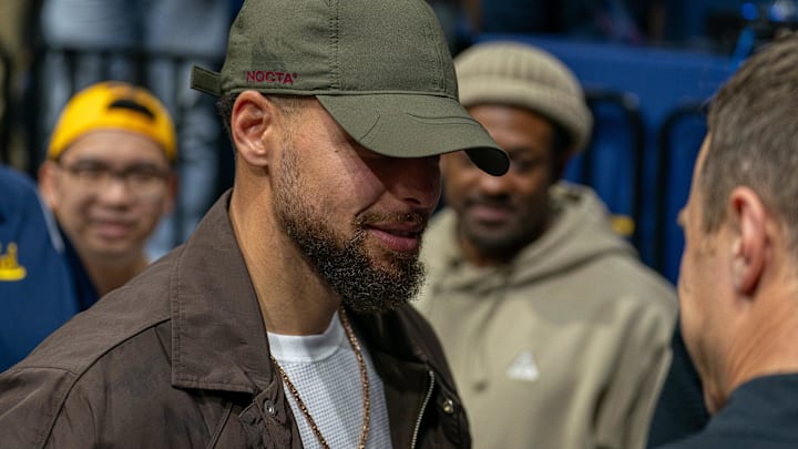 Jan 14, 2026; Berkeley, California, USA; Stephen Curry talks with Duke Blue Devils head coach Jon Scheyer after the game at Haas Pavilion. Mandatory Credit: Neville E. Guard-Imagn Images
