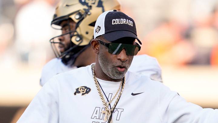 Colorado coach Deion Sanders stands on the field as the team warms up before a college football game between the Oklahoma State Cowboys (OSU) and the Colorado Buffaloes at Boone Pickens Stadium in Stillwater, Okla., Saturday, Oct. 24, 2026. Colorado coach Deion Sanders stands on the field as the team warms up before a college football game between the Oklahoma State Cowboys (OSU) and the Colorado Buffaloes at Boone Pickens Stadium in Stillwater, Okla., Saturday, Oct. 24, 2026.