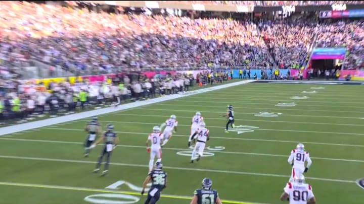 Seattle Seahawks quarterback Sam Darnold throws incomplete pass to Jaxson Smith-Njigba during the first quarter of Super Bowl LX.