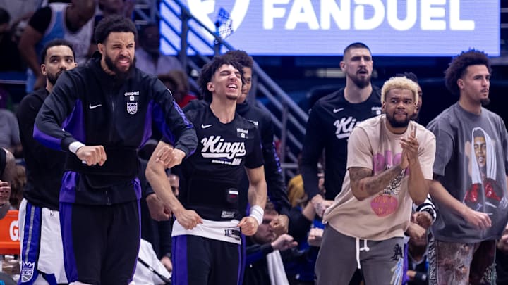 Apr 19, 2024; New Orleans, Louisiana, USA; Sacramento Kings center JaVale McGee (00) and the bench reacts to a play against the New Orleans Pelicans in the first half during a play-in game of the 2024 NBA playoffs at Smoothie King Center. Mandatory Credit: Stephen Lew-Imagn Images Apr 19, 2024; New Orleans, Louisiana, USA; Sacramento Kings center JaVale McGee (00) and the bench reacts to a play against the New Orleans Pelicans in the first half during a play-in game of the 2024 NBA playoffs at Smoothie King Center. Mandatory Credit: Stephen Lew-Imagn Images