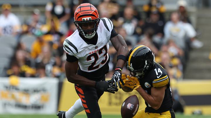 Sep 27, 2026; Pittsburgh, Pennsylvania, USA; Cincinnati Bengals cornerback Dax Hill (23) breaks up a pass intended for Pittsburgh Steelers wide receiver Roman Wilson (14) during the fourth quarter at Acrisure Stadium. Mandatory Credit: Charles LeClaire-Imagn Images Sep 27, 2026; Pittsburgh, Pennsylvania, USA; Cincinnati Bengals cornerback Dax Hill (23) breaks up a pass intended for Pittsburgh Steelers wide receiver Roman Wilson (14) during the fourth quarter at Acrisure Stadium. Mandatory Credit: Charles LeClaire-Imagn Images