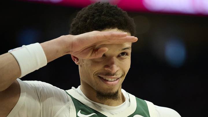 Milwaukee Bucks guard Ryan Rollins (13) salutes a fan during the first half against the Portland Trail Blazers at Moda Center on Mar 25, 2026.
